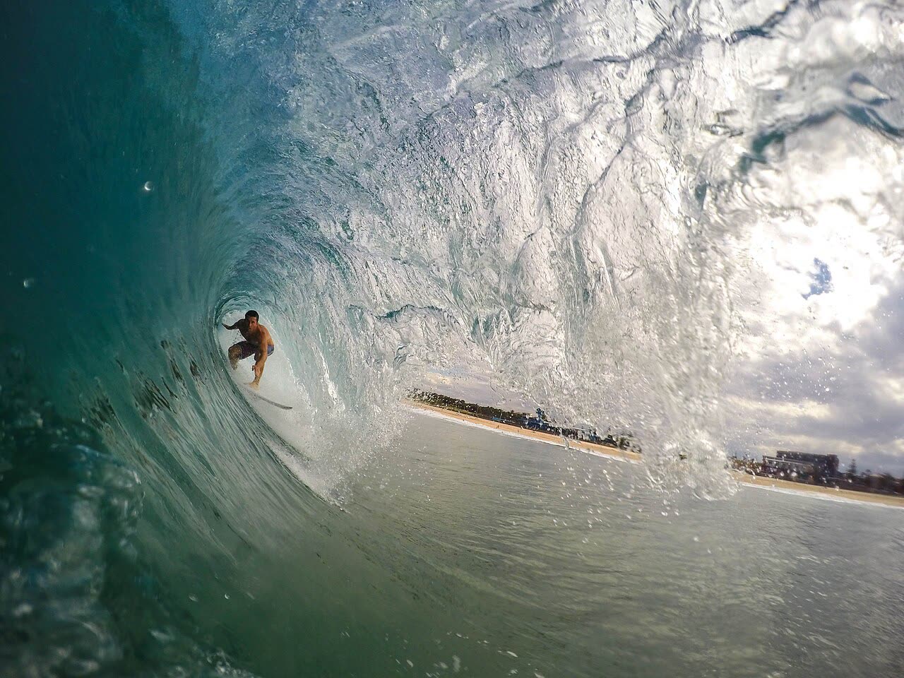 Surfer inside a barrel